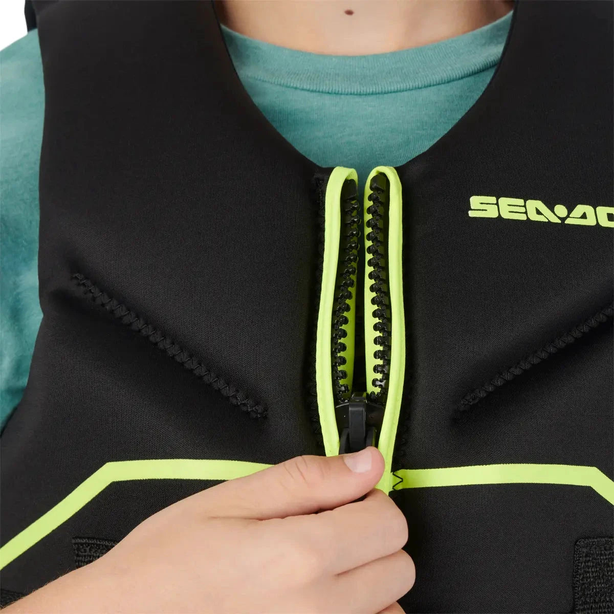 Sea-Doo Junior Freedom PFD/Life Jacket in black with neon lime zipper trim and Sea-Doo logo.
