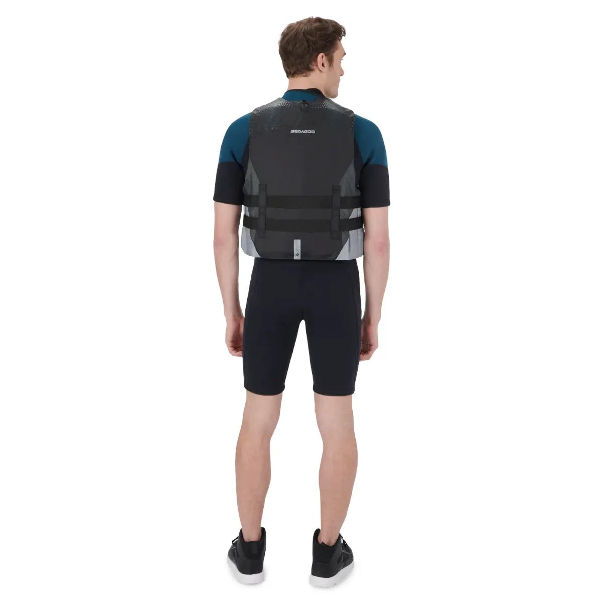 Sea-Doo Motion Life Jacket Black and gray worn by a man; back view with visible Sea-Doo logo.