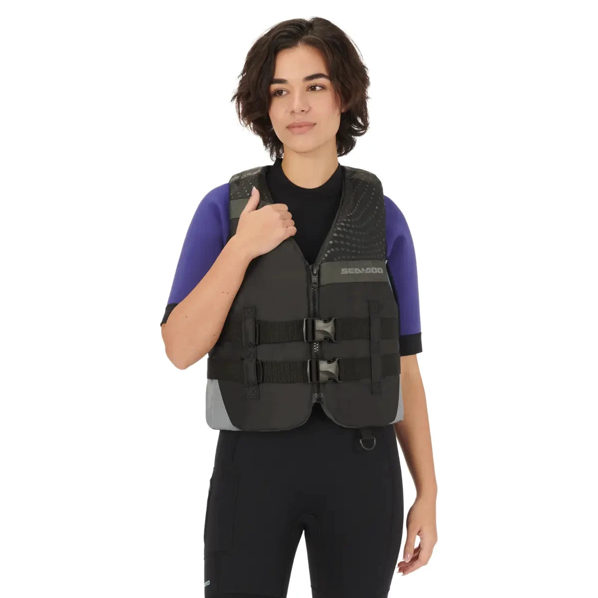 Sea-Doo Motion Life Jacket Black, a three-buckle PFD worn by a person.