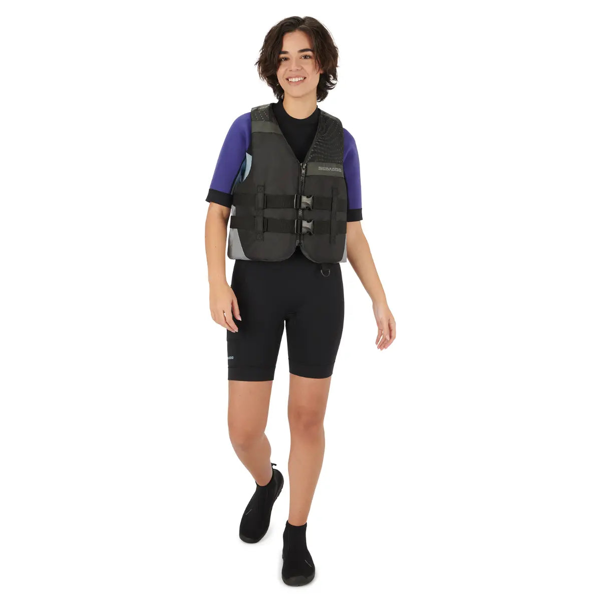Sea-Doo Motion Life Jacket Black, a PFD with three front buckles and adjustable straps worn by a model