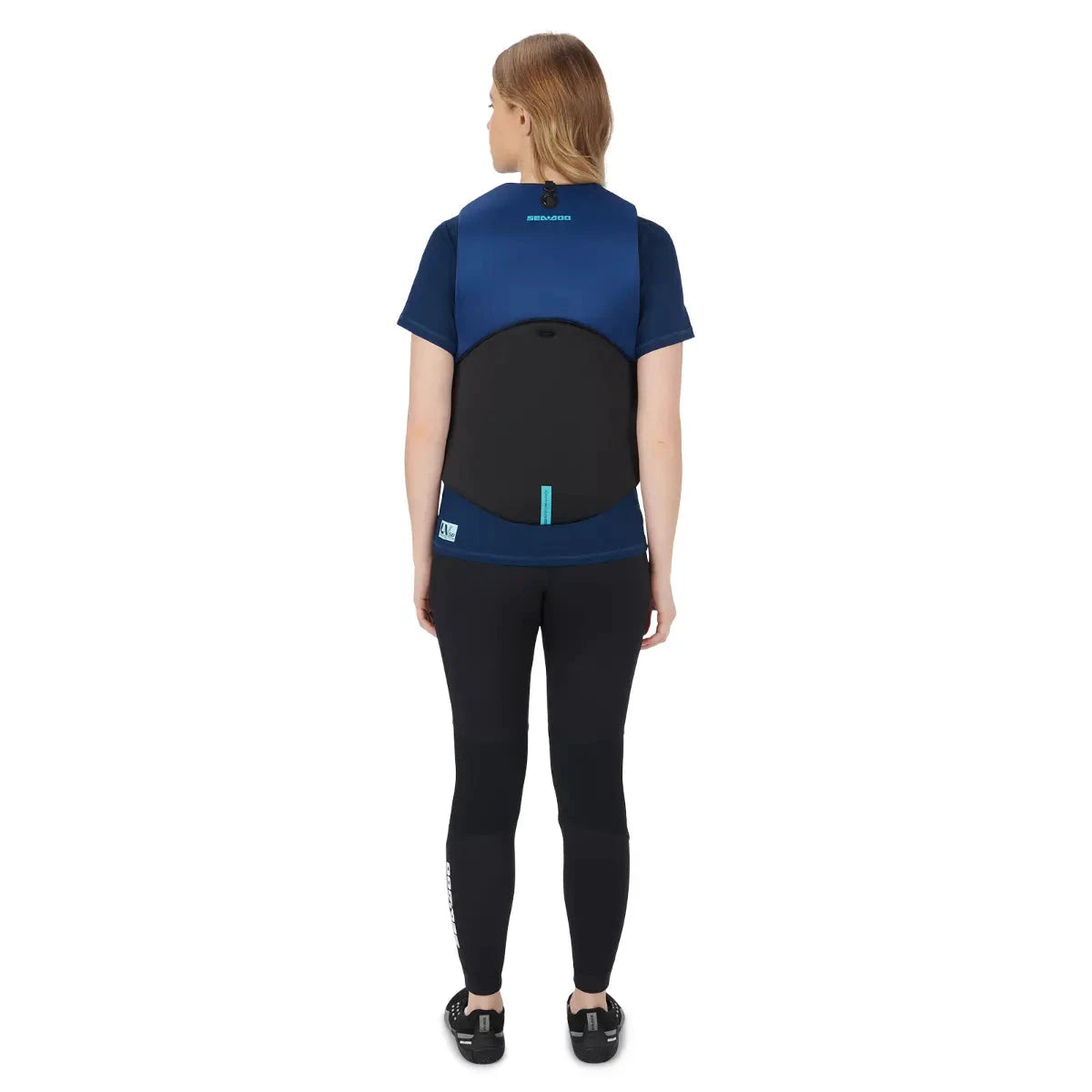 Sea-Doo Freedom PFD Blue life jacket by BRP; blue body with black back panel worn by model