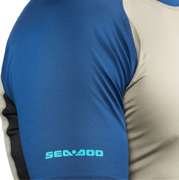 Sea-Doo men's short sleeve rashguard, blue and beige colorblock with Sea-Doo logo
