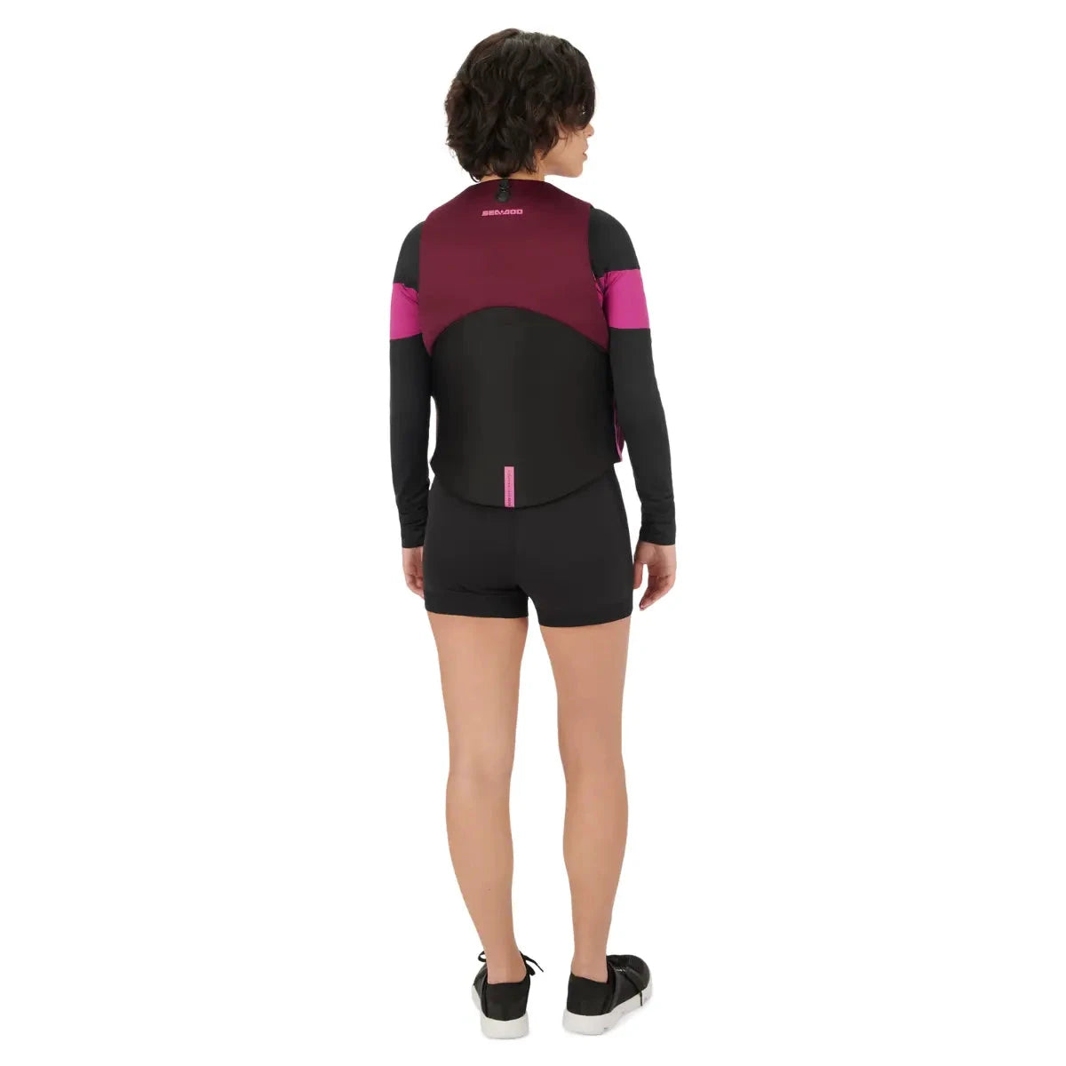 Sea-Doo Freedom Stream PFD Life Jacket Lava Red, back view on model with black and pink sleeves