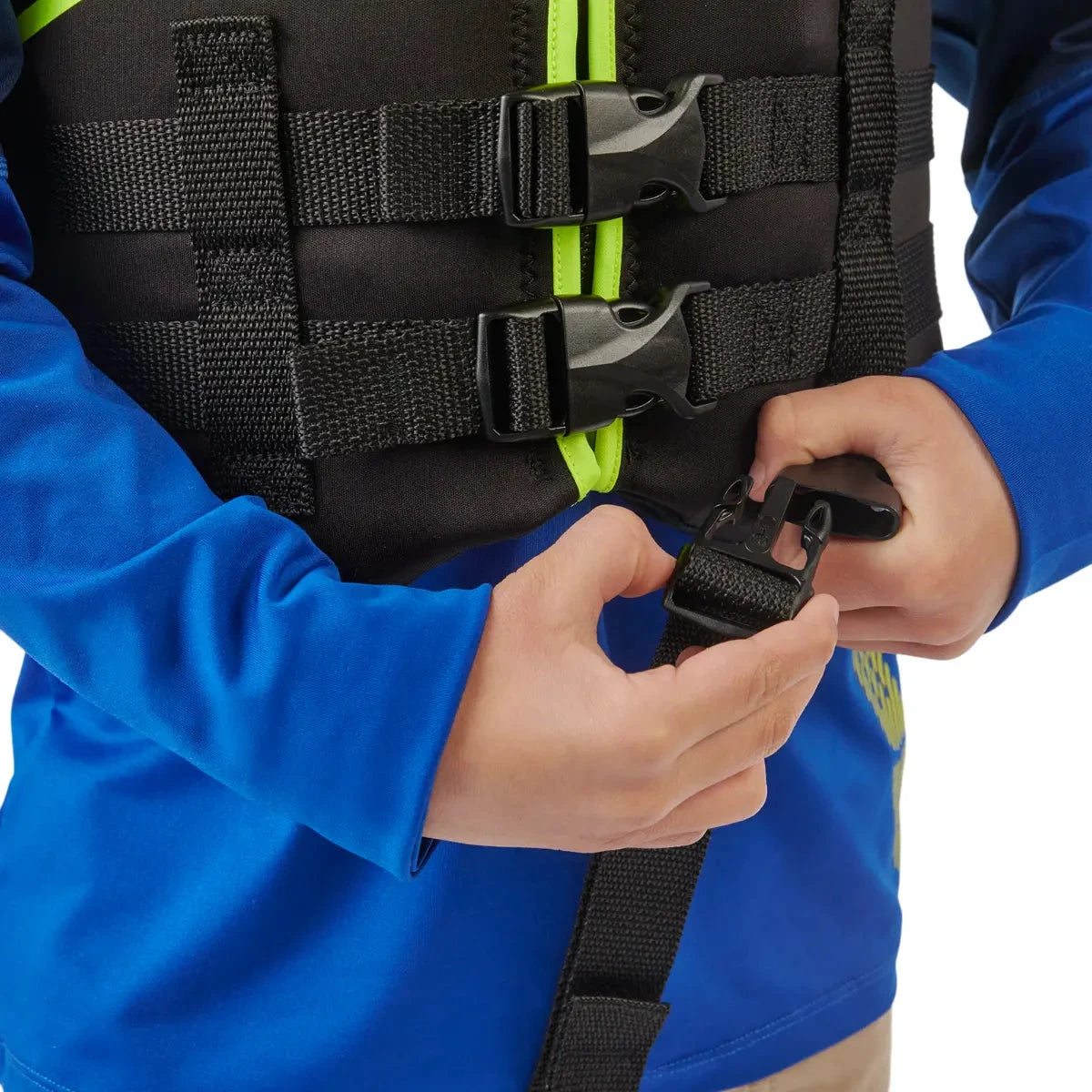 Sea-Doo Unisex Kids’ Freedom PFD/Life Jacket in black with neon-green zipper being buckled