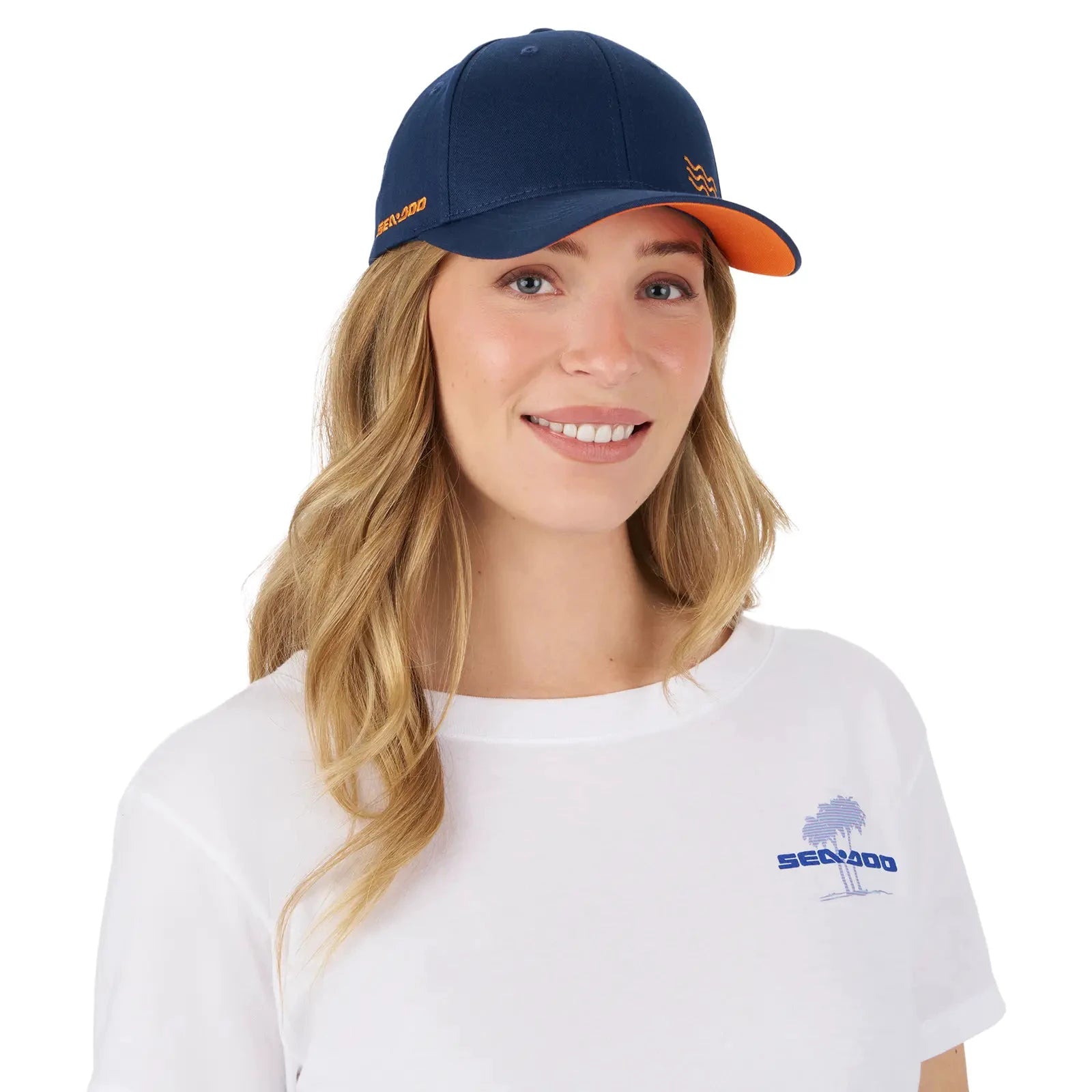 Sea-Doo Wave Signature Cap, navy blue baseball cap with orange underbill and Sea-Doo branding.