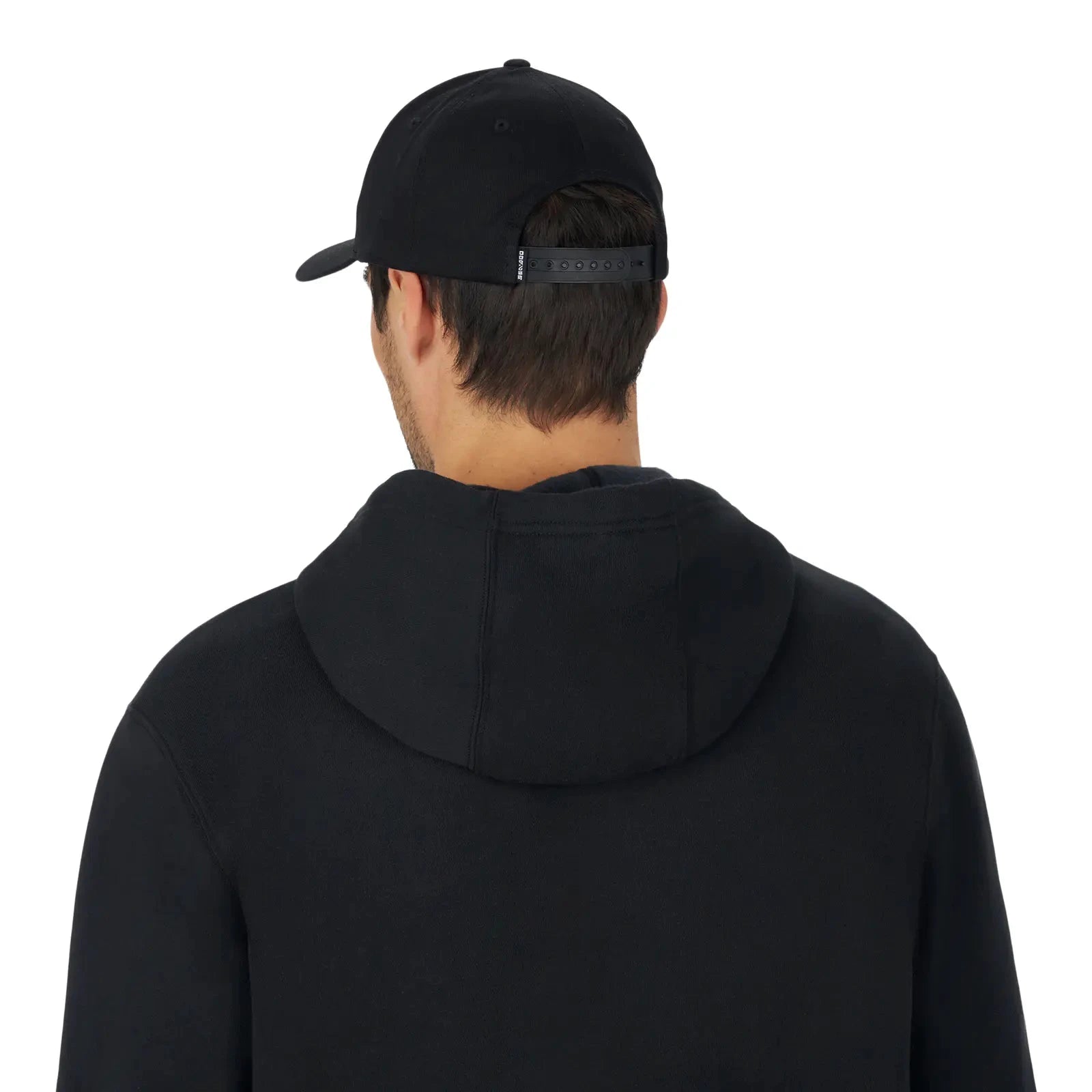Sea-Doo Wave Signature Cap, black adjustable baseball cap worn by a person in a black hoodie