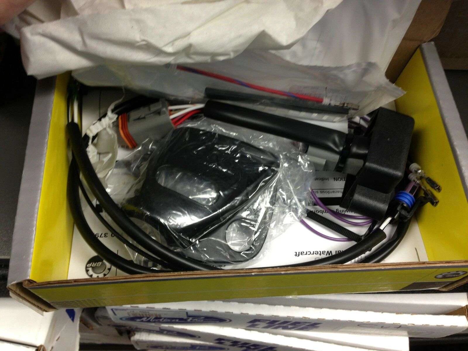 Sea-Doo variable trim module 295100379, OEM BRP watercraft part with black body and wiring harness