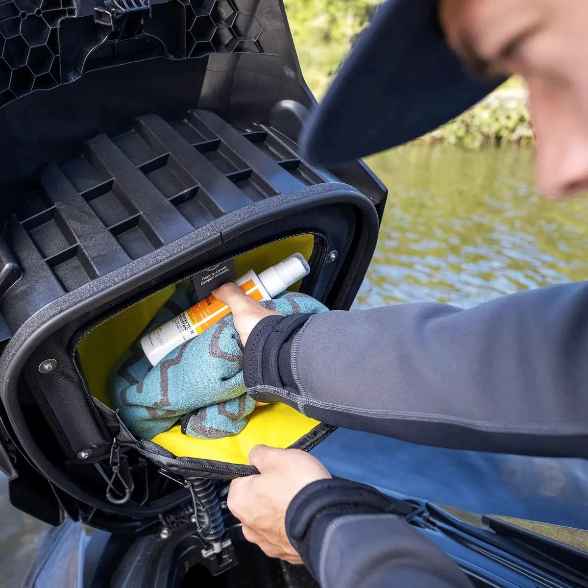 Sea-Doo GTI & GTR Lid Organizer for PWC, yellow-lined lid storage with sunscreen and towel