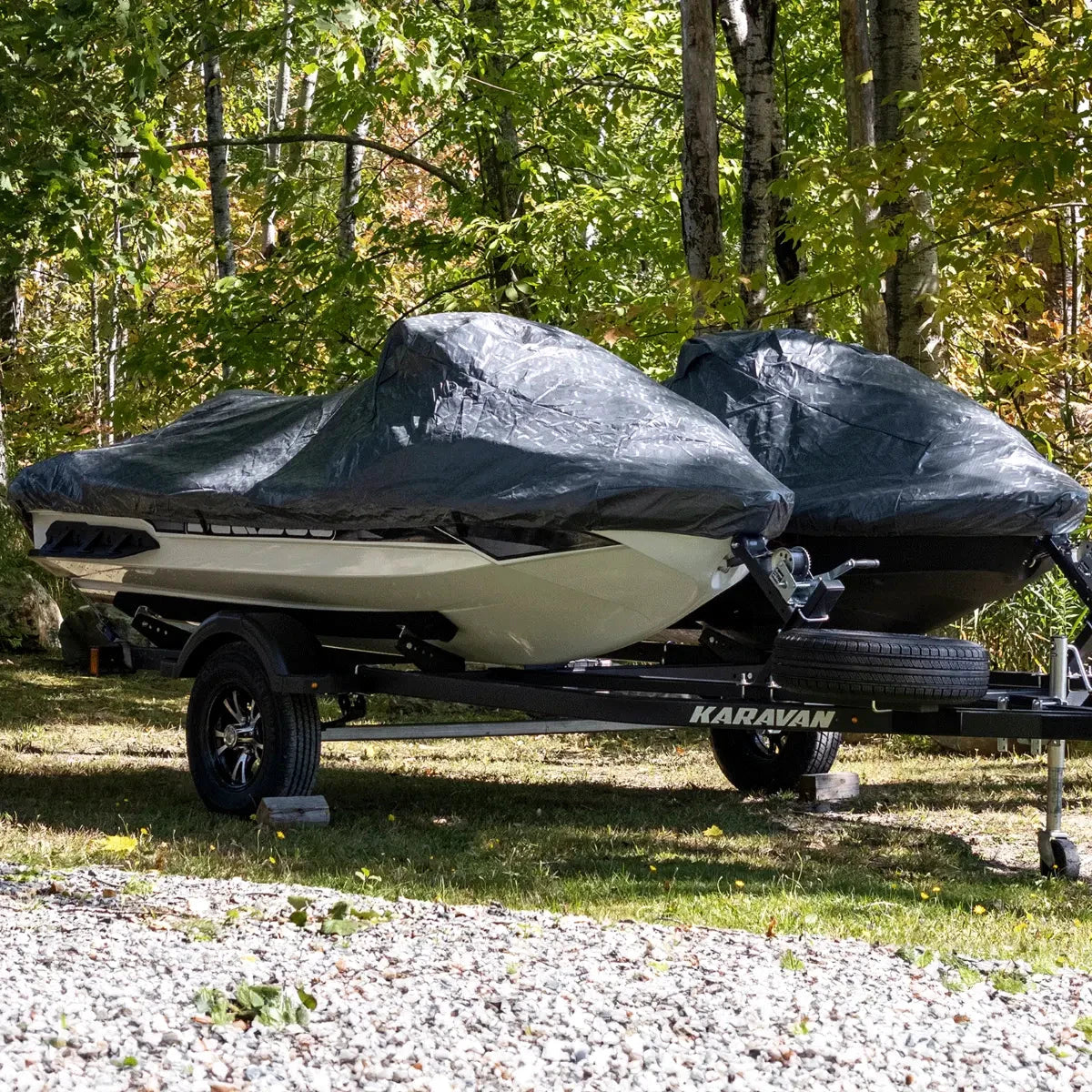 Sea-Doo All-Climate PWC storage covers on two black jet skis on a Karavan trailer