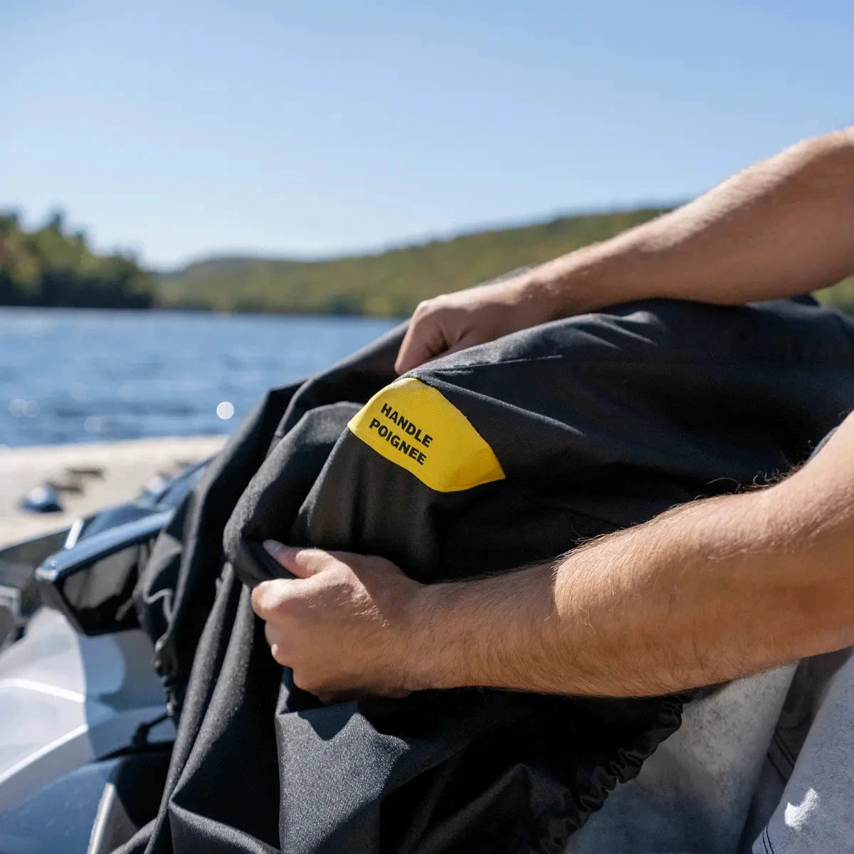 Sea-Doo PWC cover in black fabric with yellow handle tag