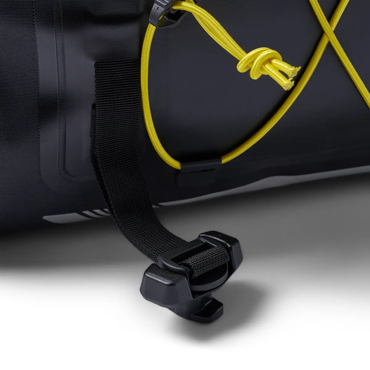 Sea-Doo LinQ Explorer Bag with black strap and bright yellow cord on a vehicle storage accessory