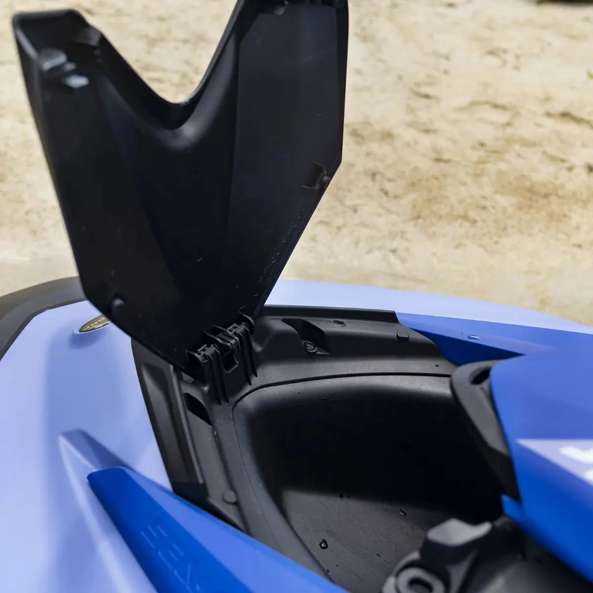Sea-Doo Spark Front Storage Bin Kit; black plastic storage bin with lid open on blue watercraft.