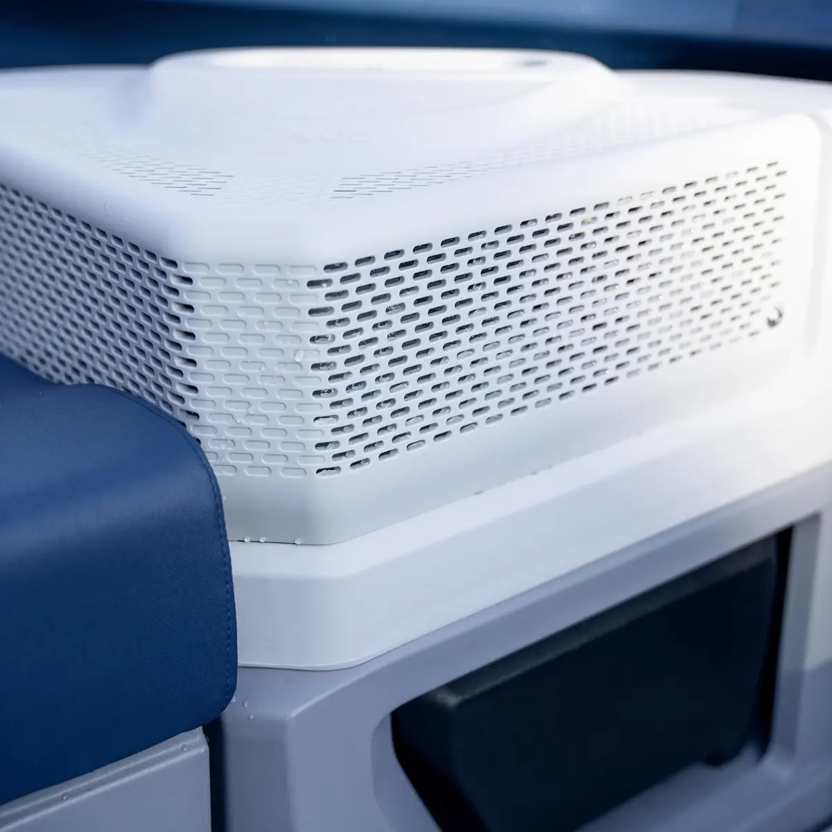 Sea-Doo Switch Fourth JL Audio speaker enclosure with white perforated grille on watercraft console
