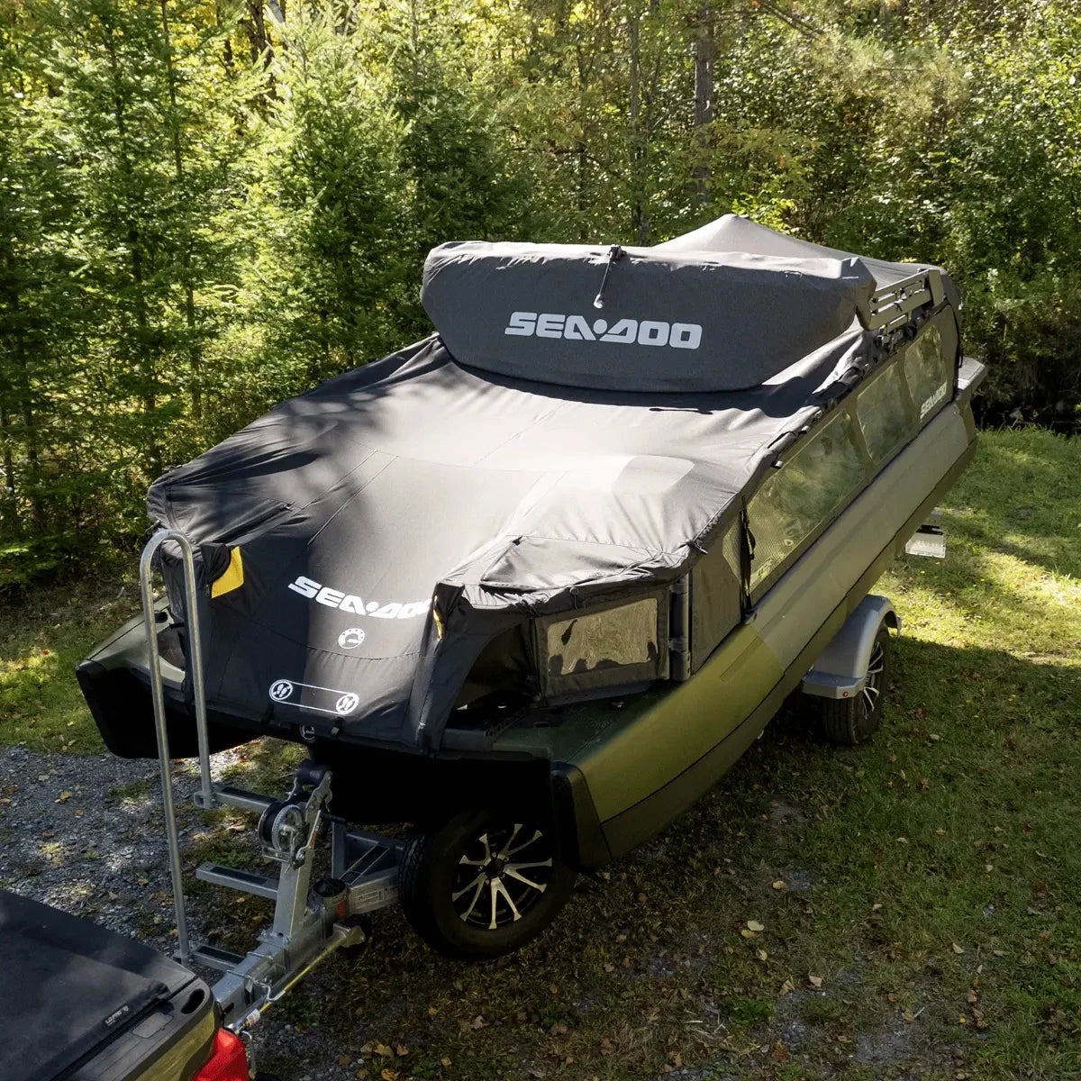 Sea-Doo Switch Sport 18 mooring and trailering cover in dark gray with SEA-DOO branding, on a trailer.