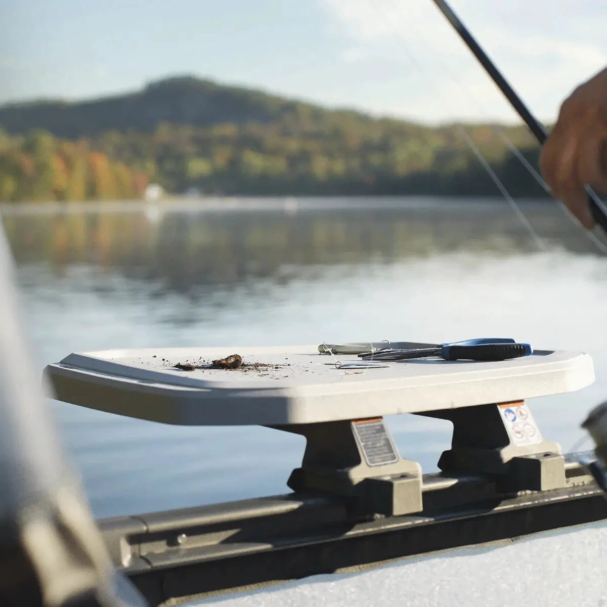 Sea-Doo Switch Rail Service Table, white, mounted on a boat deck with tools