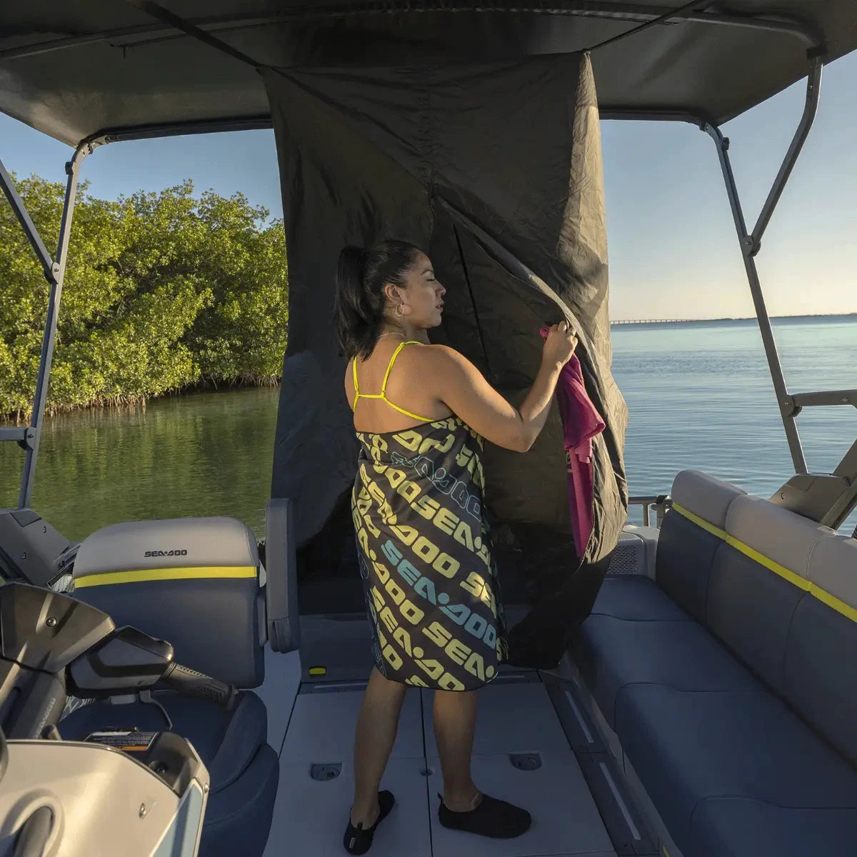 Sea-Doo Switch pop-up changing room on BRP watercraft; dark fabric privacy shelter.