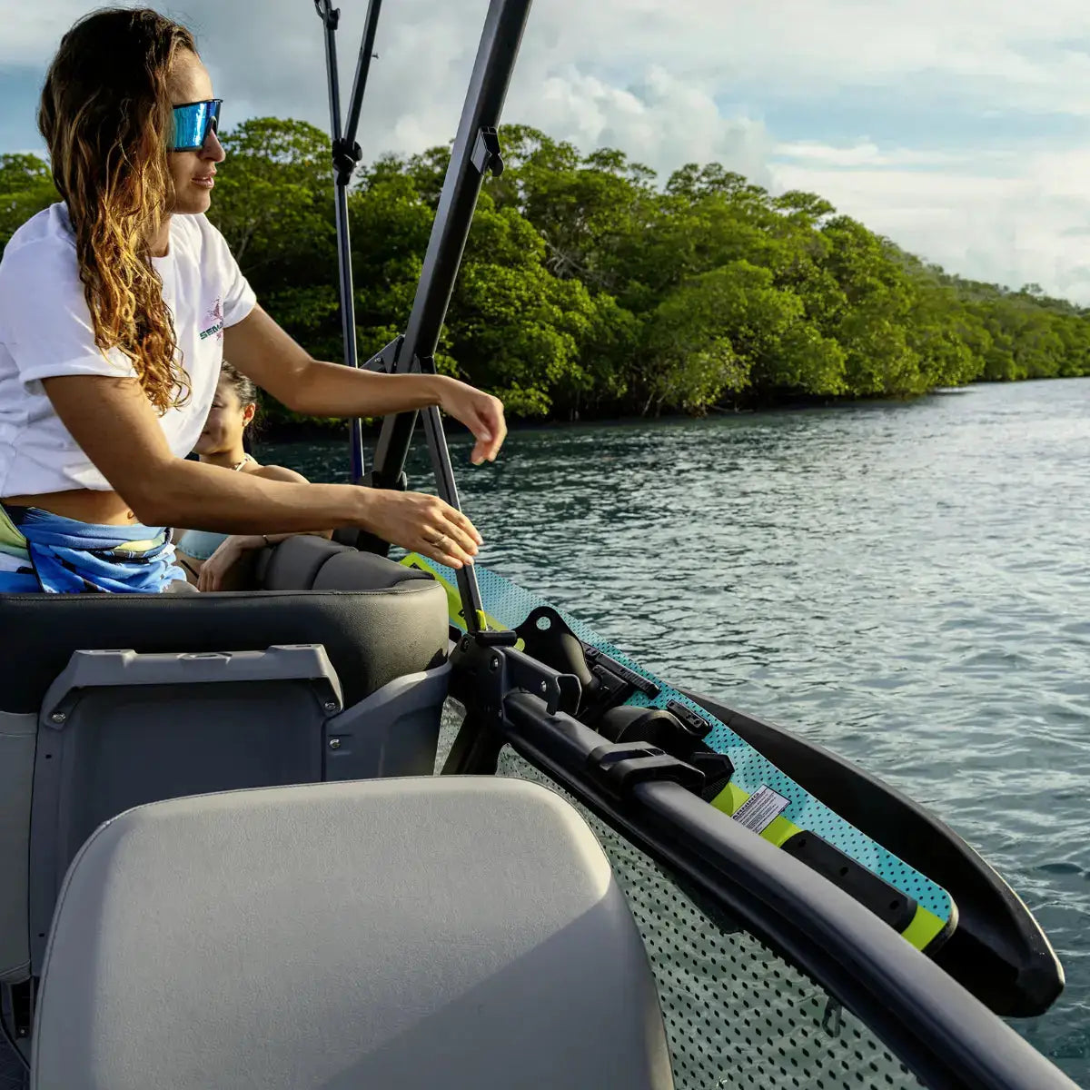 Sea-Doo LinQ Waterski Holder for Switch Pontoon with two neon-yellow water skis