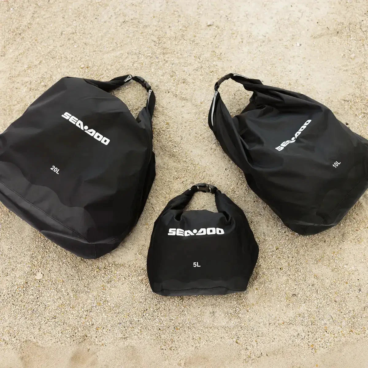 Sea-Doo 3-pack watertight roll-top bags, black with white Sea-Doo logos (20L, 10L, 5L)