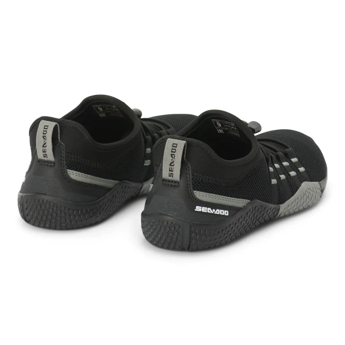 Sea-Doo Aqua Shoes 444268 pair, black mesh riding footwear with grey trim and textured rubber soles.