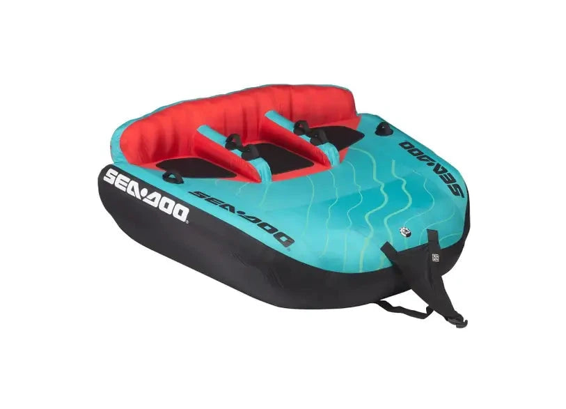 Sea-Doo three-person sit-on-top towable tube in turquoise with red seating and black bottom.
