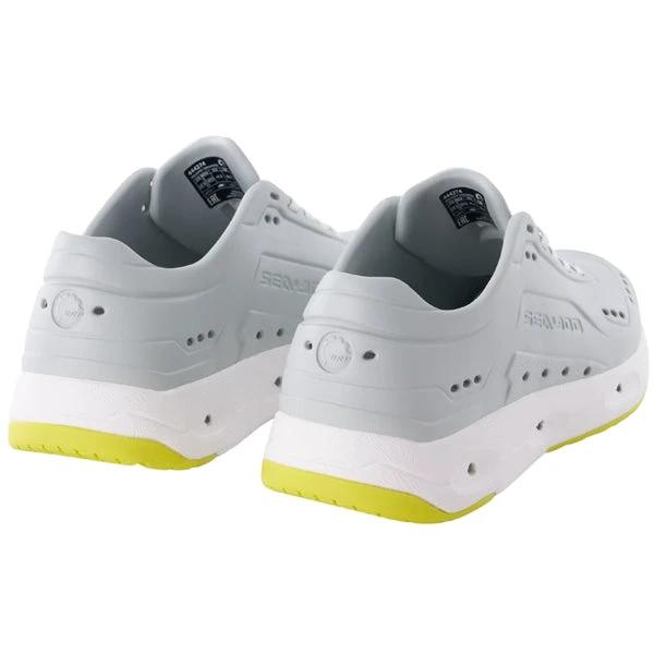 Sea-Doo Aqua Dry Riding Sneakers pair white with grey accents and yellow sole.
