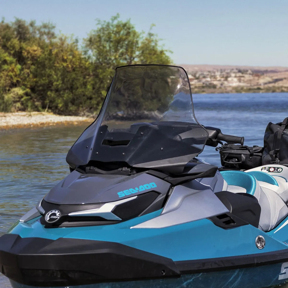 Sea-Doo PWC Touring Windshield, smoke-tinted, mounted on a blue Sea-Doo watercraft