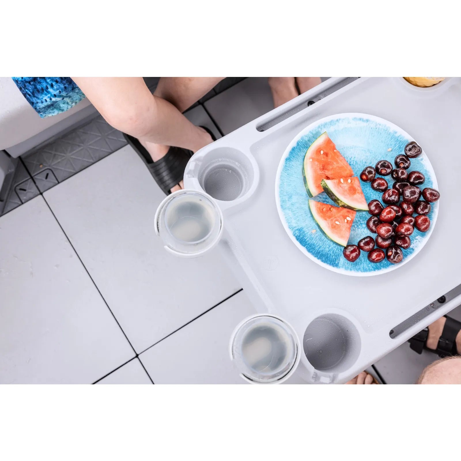 Sea-Doo Switch Adjustable Table, gray plastic with two cup holders and a fruit plate